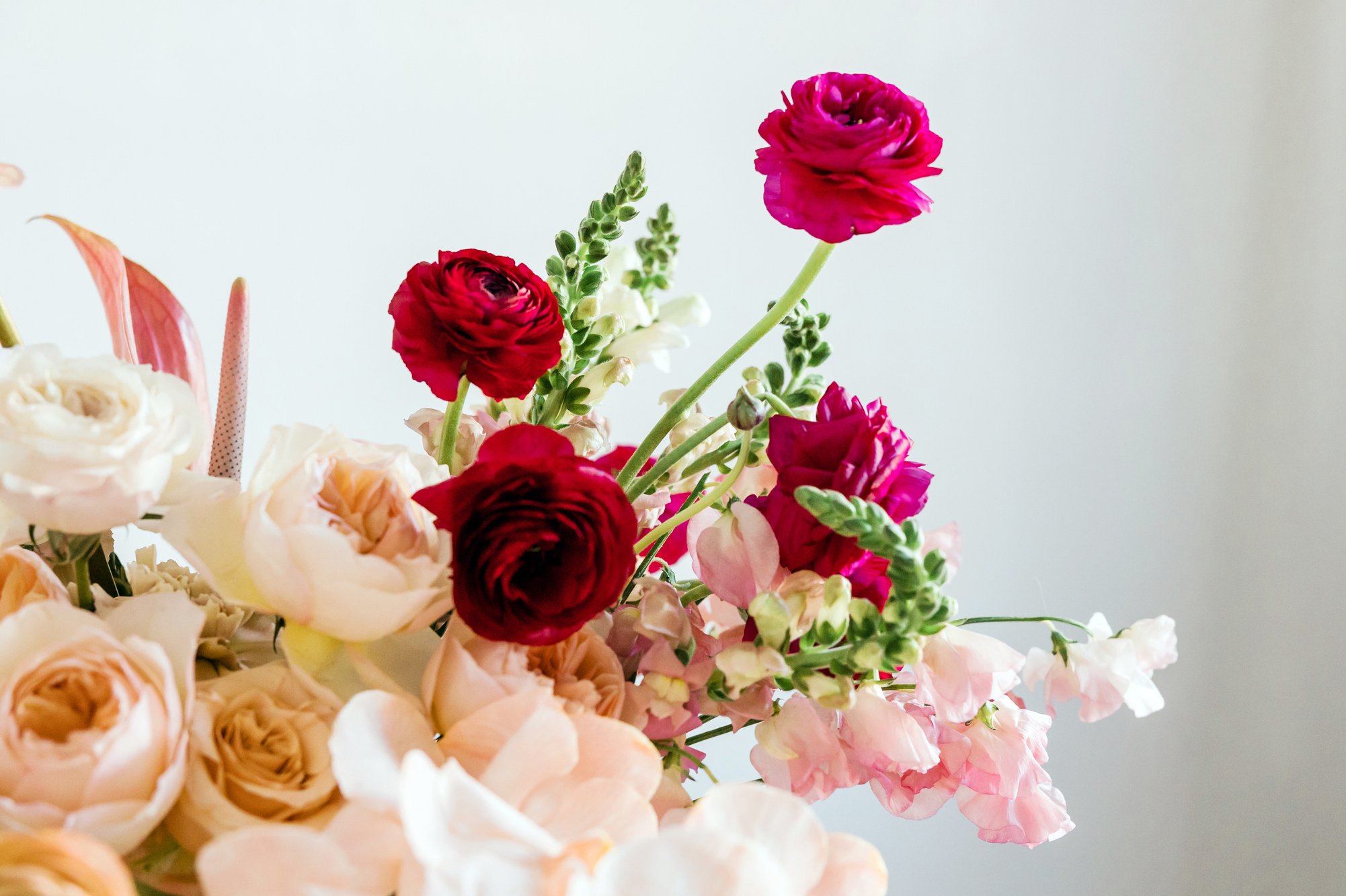 Bright Red and Peach Floral Arrangement